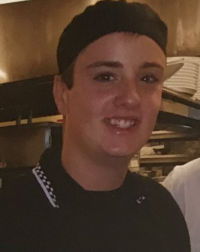 image of a young man with a chef hat on